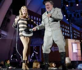 rebecca romijn s racy costumes steal the show in an all star performance of the producers at the