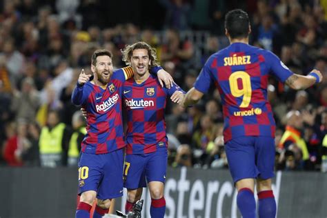 messi marks 700th barcelona appearance with goal in win over dortmund
