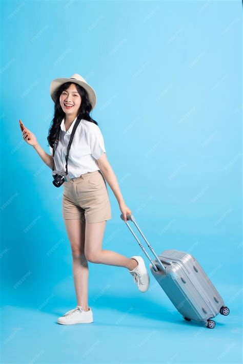 Premium Photo Portrait Of Beautiful Asian Girl Traveling Isolated On
