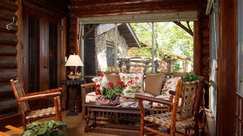 explore  rustic chic finishes   renovated  lakefront log home rustic porch