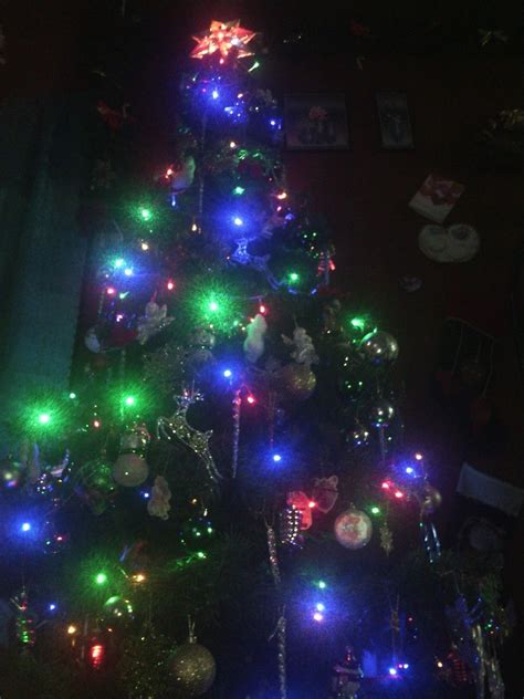 finally finished decorating the christmas tree with multicolored led