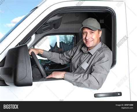 smiling truck driver   car delivery cargo service stock photo