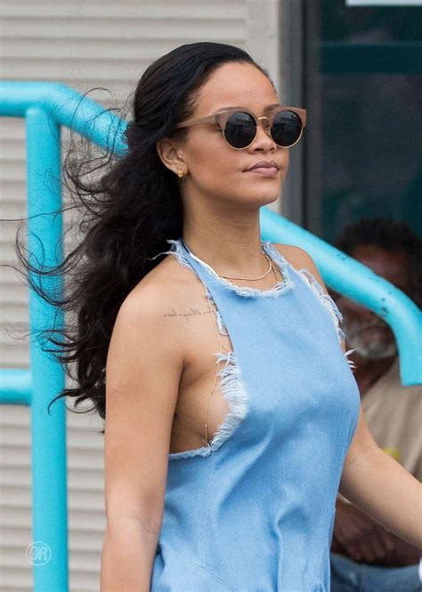 rihanna wearing a short blue dress in barbados photo rihanna 2016