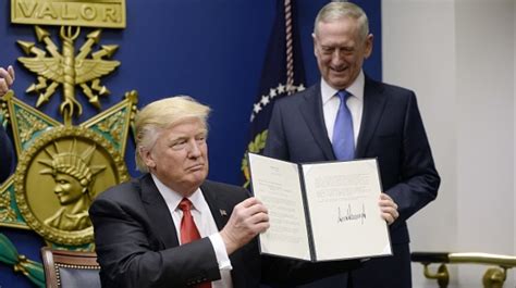 trump signs extreme vetting order to block refugees