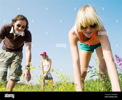 young people     field stock photo alamy