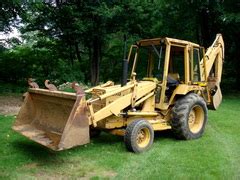 ford  backhoe parts helpline     alma tractor equipment  call