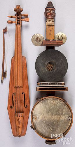 handmade folk art stringed instruments sold  auction