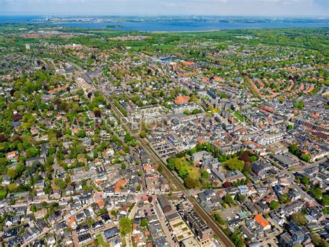 aerophotostock luchtfoto bussum centrum en het spiegel met centraal de spoorlijn amsterdam