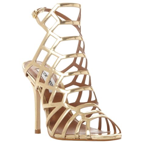 steve madden slithur caged stiletto heel sandals in metallic lyst