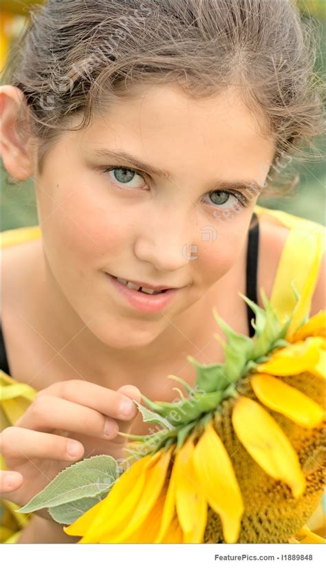 fine art beauty teen girl and sunflower stock picture