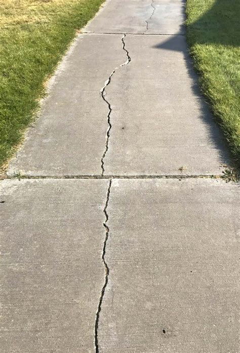 cracked sidewalk vertical geology pics