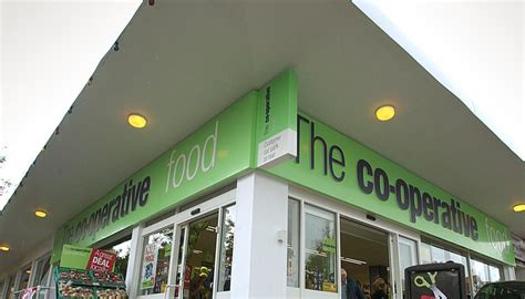 operative group sells  stores  closes  news  grocer