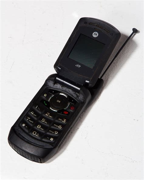 te motorola black flip cell phone prop rental acme brooklyn