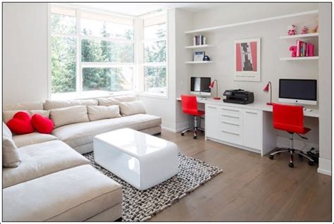 living room filled  white furniture  red pillows  top   wooden floor
