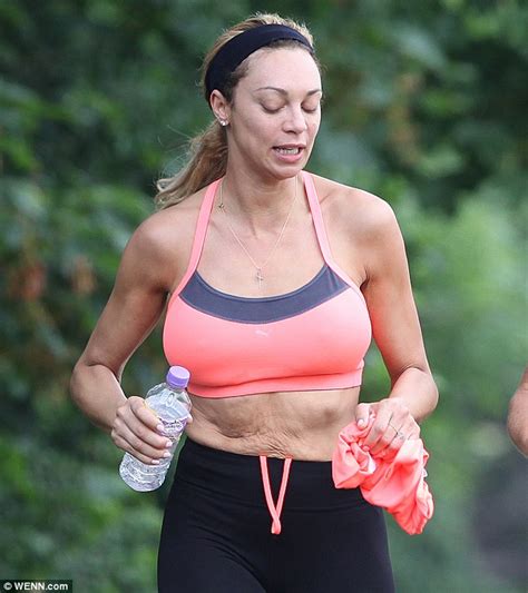 lilly becker shows off her ample assets in sports bra as she goes for a gruelling run daily