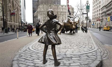 new york fearless girl who faced down wall street s bull moved to new