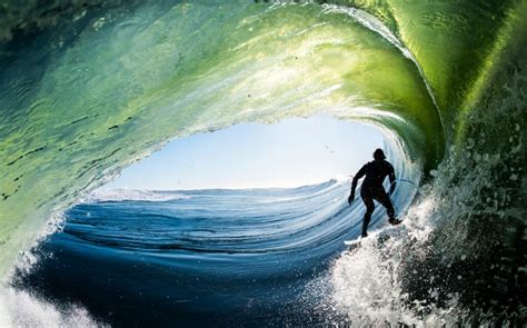 incredible shots of pro surfers riding waves taken from