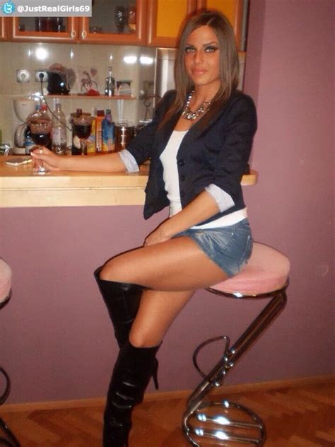stunner in short denim skirt and kinky leather boots very sexy styling from head to toe