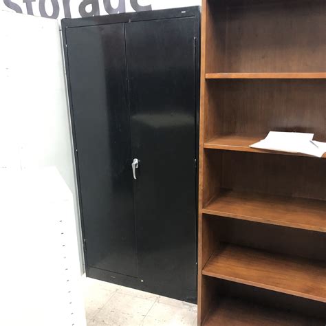 black storage cabinet redeemed office