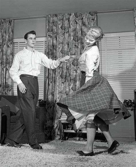 1950s teenage couple jitterbug dancing photograph by