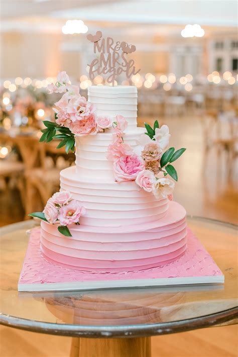 elegant pink wedding cake  pink flowers photo susan elizabeth photography florist