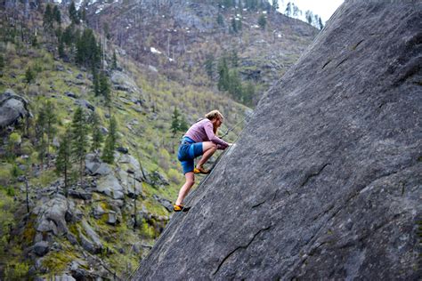 man climbing  rock mountain  stock photo