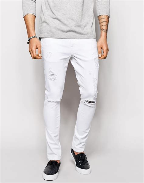 asos super skinny jeans with extreme rips in white for men lyst