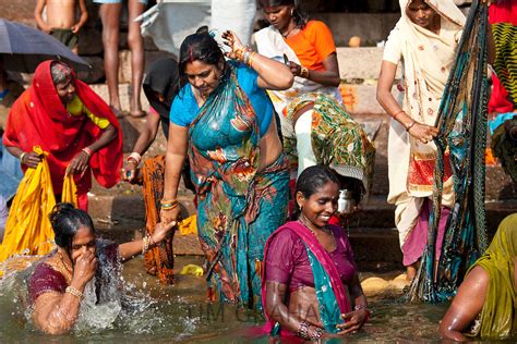 hindu pilgrims bathing in river ganges varanasi india tim graham