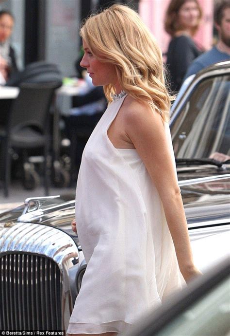 a heavily pregnant sienna miller keeps working as she