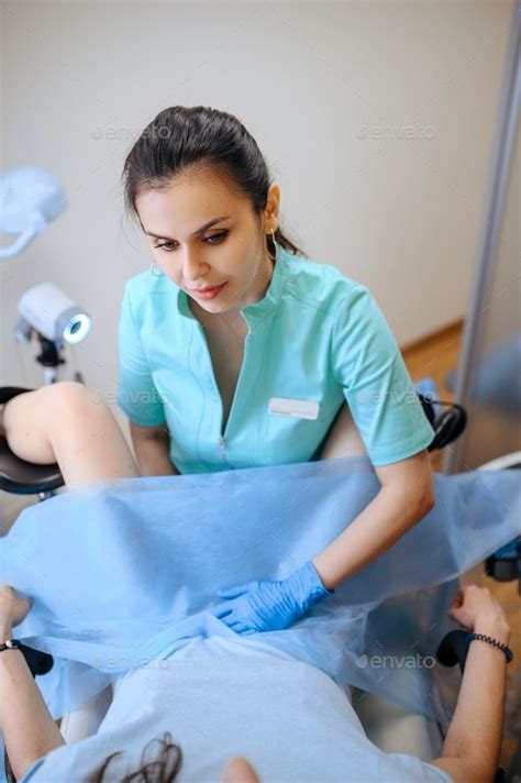 Female Gynecologist Works With Patient In Chair Beautiful Nurse