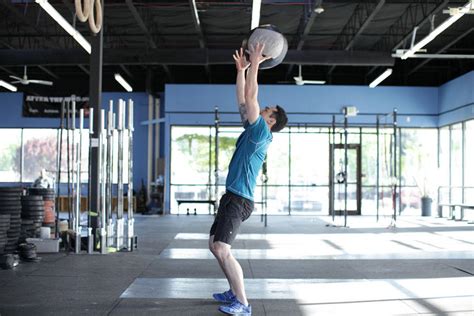 Medicine Ball Scoop Throw Exercise Guide And Video
