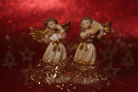 Download Red Aesthetic Christmas Angels Wallpaper
