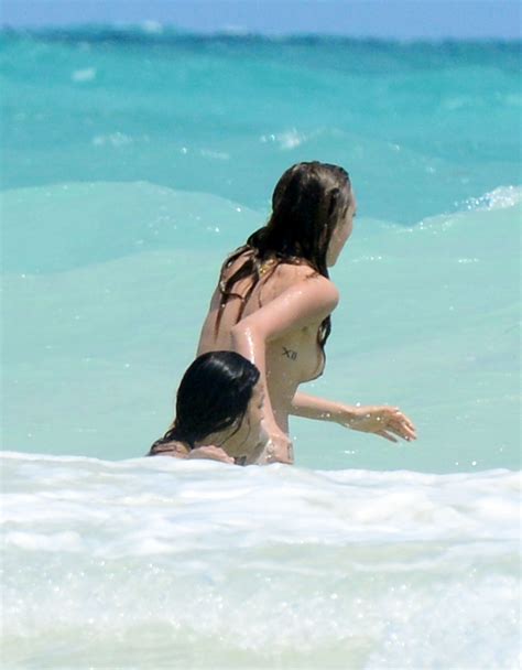 cara delevingne and michelle rodriguez topless beach affair