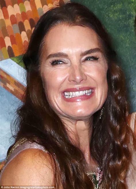 brooke shields and helena christensen stun at art auction daily mail