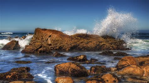 waves splash on beach rocks hd wallpaper