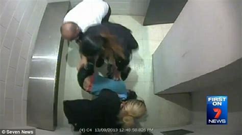 a woman bashed by a security guard has now been charged
