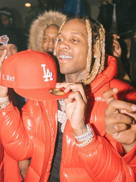 lil durk wearing  la dodgers red fifty red moncler puffer