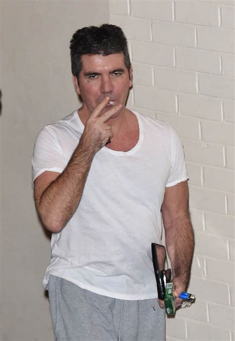 simon cowell fined £100 to spark up cigarette at x factor daily star