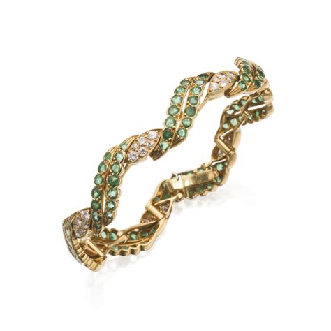 216 18 karat gold emerald and diamond bracelet rené boivin france