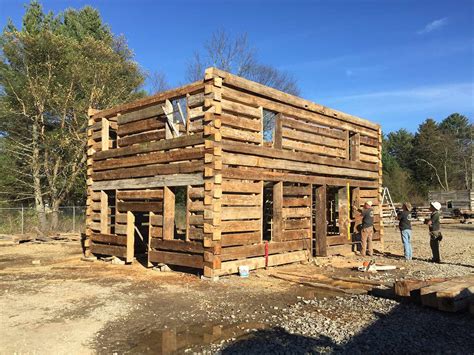 handcrafted log house built  barnwood builders  structure   featured