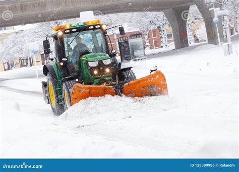 tractor plowing snow editorial photo image  sodertalje