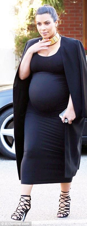 Pregnant Kim Kardashian Bursts Out Of Yet Another Skin Tight Outfit