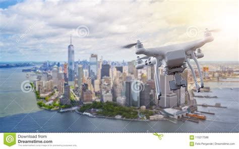 drone flying  manhatten  york city stock photo image  quadrocopter aviation