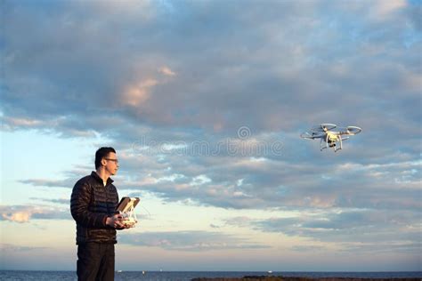 man flying drone  remote control   beach stock image image  surveillance flying