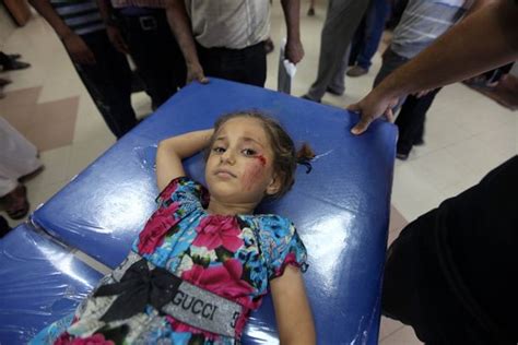 at least 15 dead as israel shells un school sheltering
