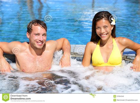 Hot Tub Couple In Spa Wellness Jacuzzi Royalty Free
