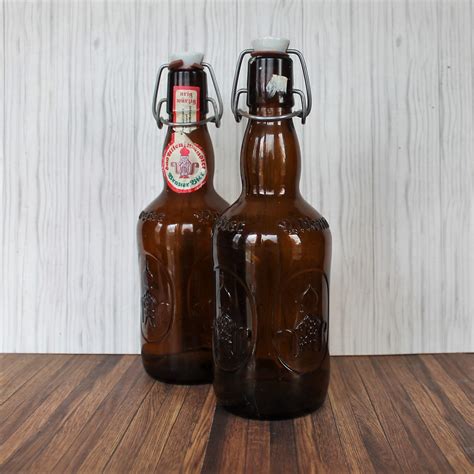 vintage brauer bier beer bottle set   brown amber glass bottle  ceramic cap  bail