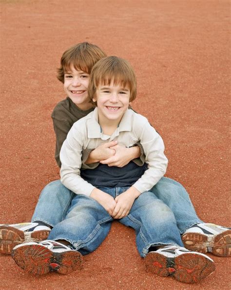 boys hugging stock photo image  brother child autumn