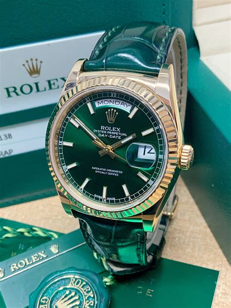 rolex day date  yellow gold green dial