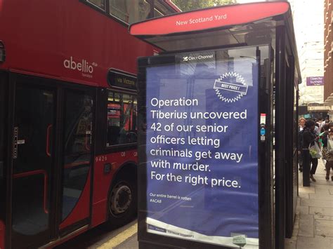 Posters Branding Force Totally Corrupt Appear Near Scotland Yard